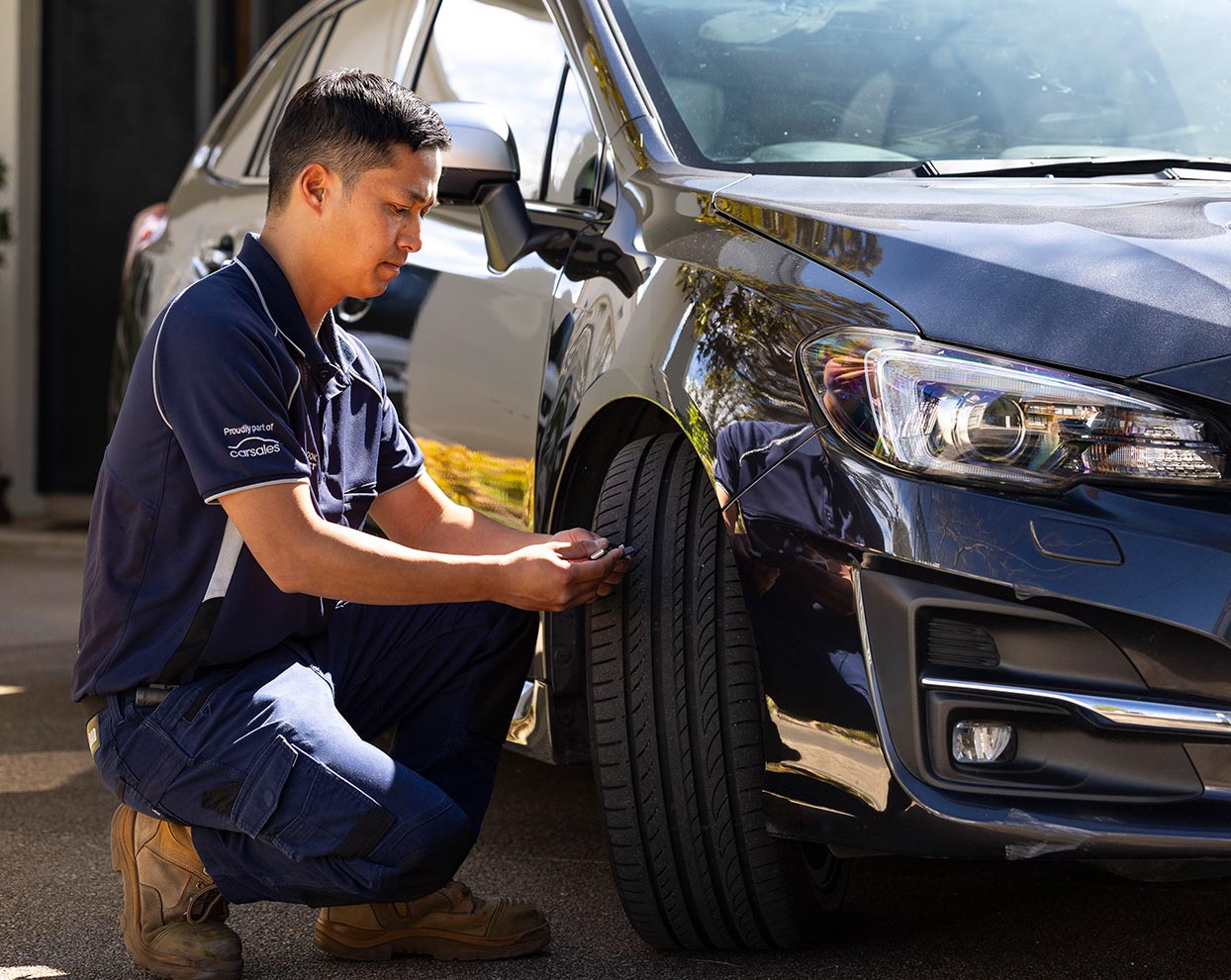 mobile pre purchase inspection by a mechanic at RedBook Inspect