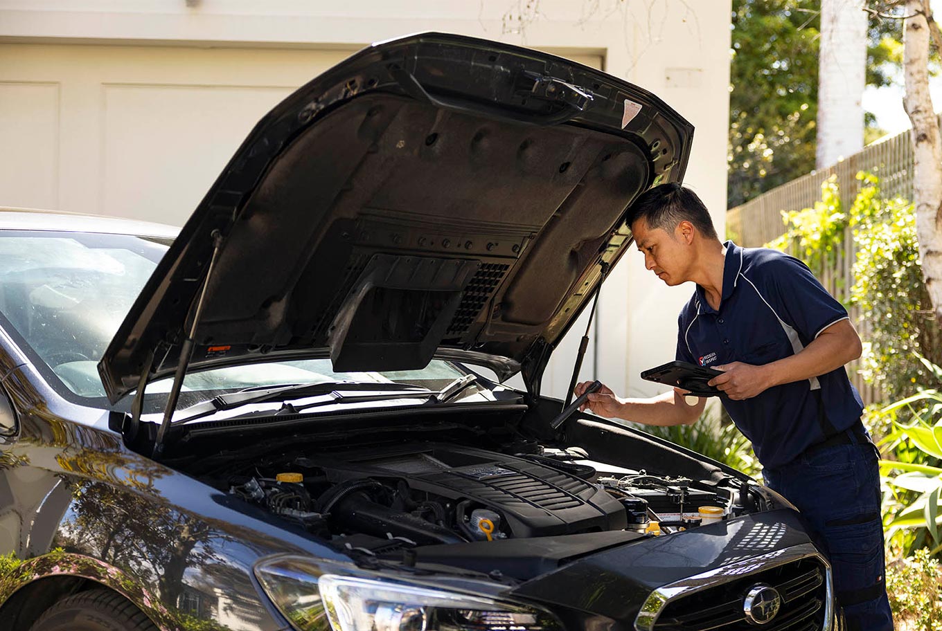 An inspector inspecting a car